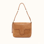 A tan suede shoulder bag with braided leather trim and a matching braided shoulder strap, shown against a plain off-white background.