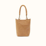 Tan handbag with rope handles on a white background
