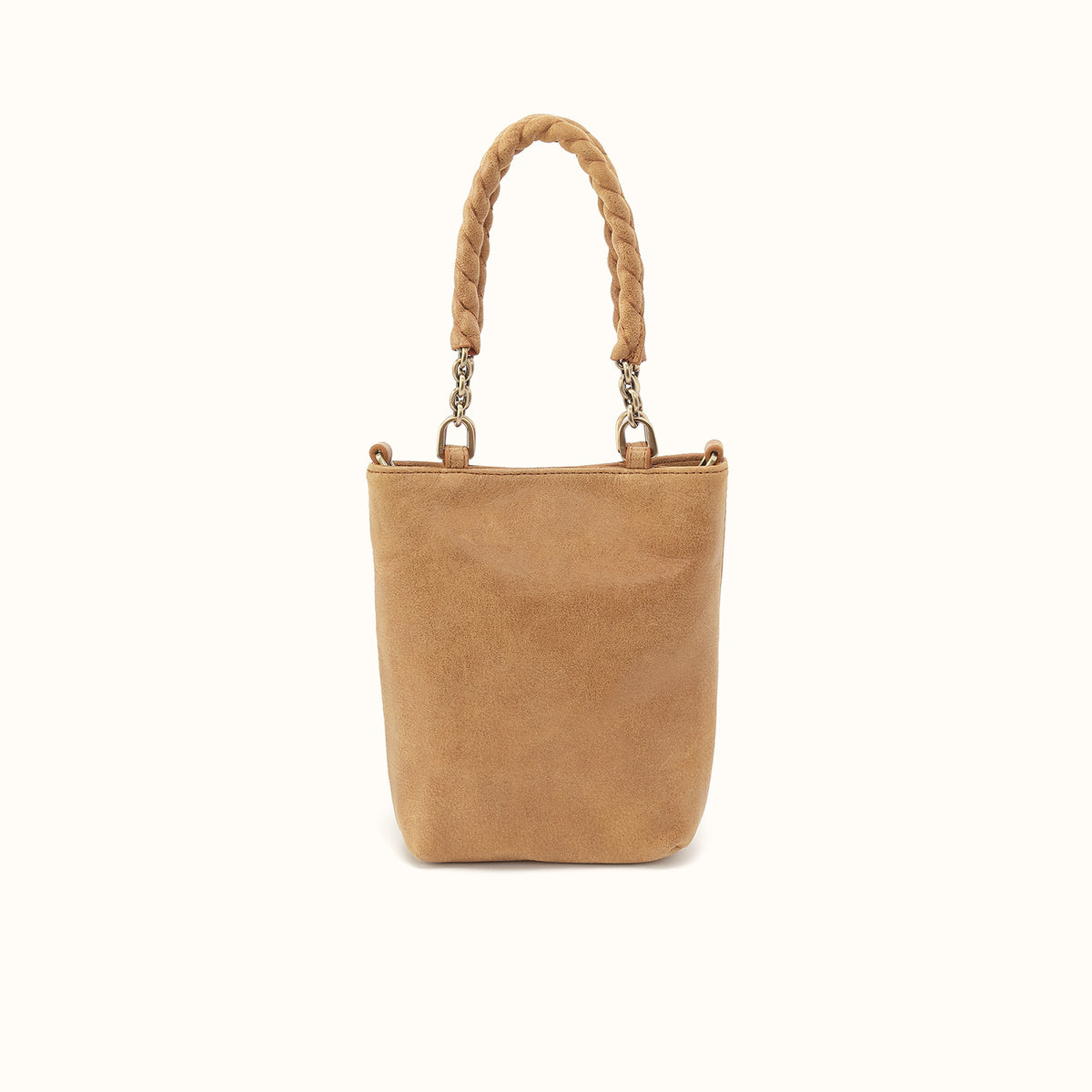 Tan handbag with rope handles on a white background
