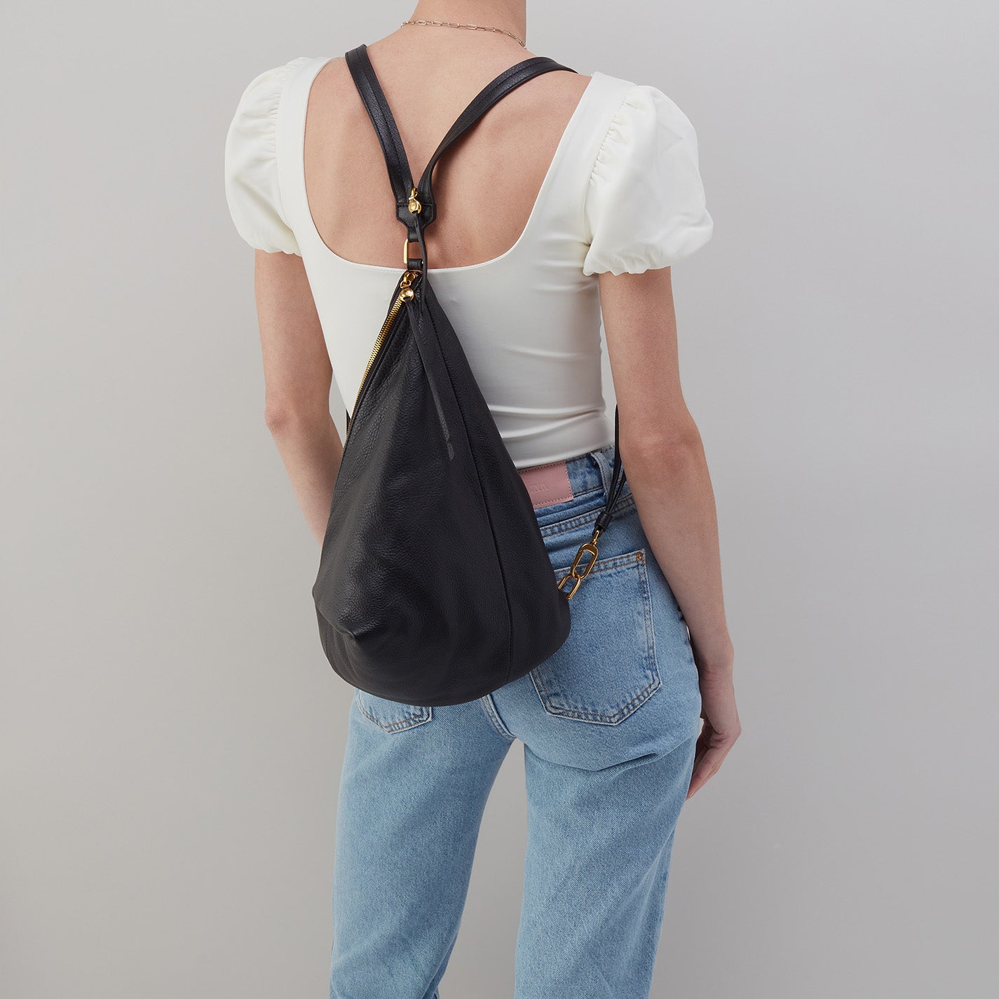 Sway Convertible Sling in Pebbled Leather Black HOBO