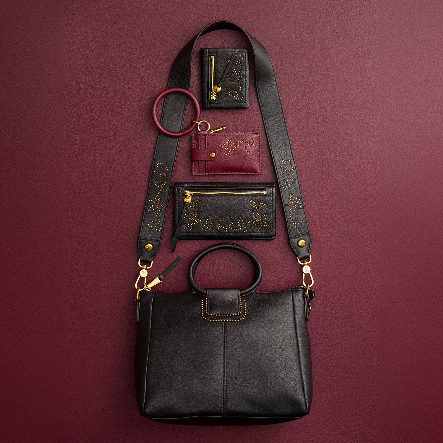 Lumen Continental Wallet in Pebbled Leather - Black With Studs – HOBO