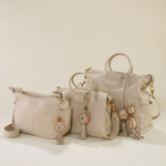 Sheila Crossbody With Charm In Pebbled Leather - Stonewash