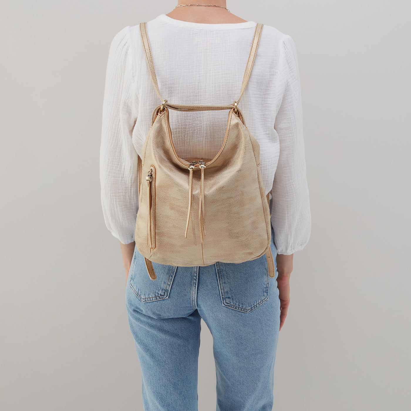 Merrin Convertible Backpack In Metallic Leather - Gold Leaf – HOBO