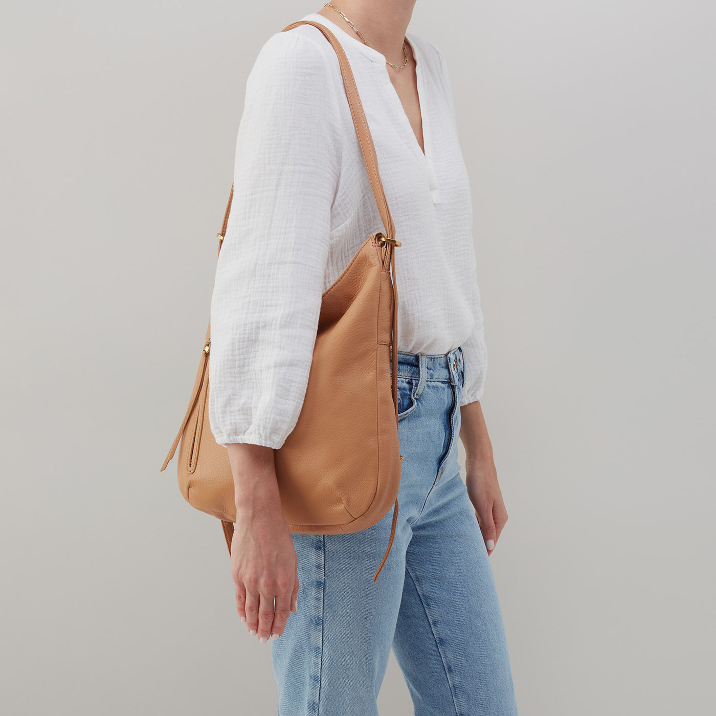 Merrin Convertible Backpack in Pebbled Leather Sandstorm HOBO